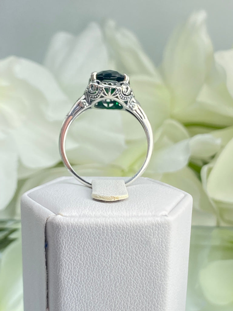 Emerald green Ring, Oval emerald green gemstone, sterling silver floral filigree, Edward Design #D70, on a ring holder