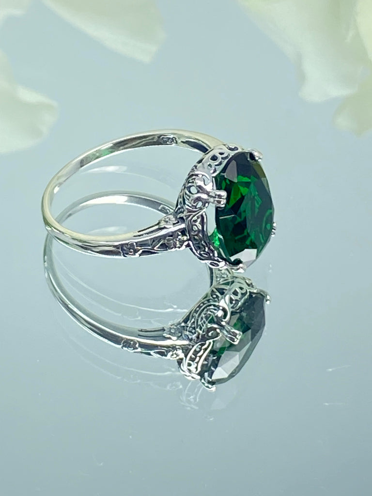 Emerald green Ring, Oval emerald green gemstone, sterling silver floral filigree, Edward Design #D70, on a mirror