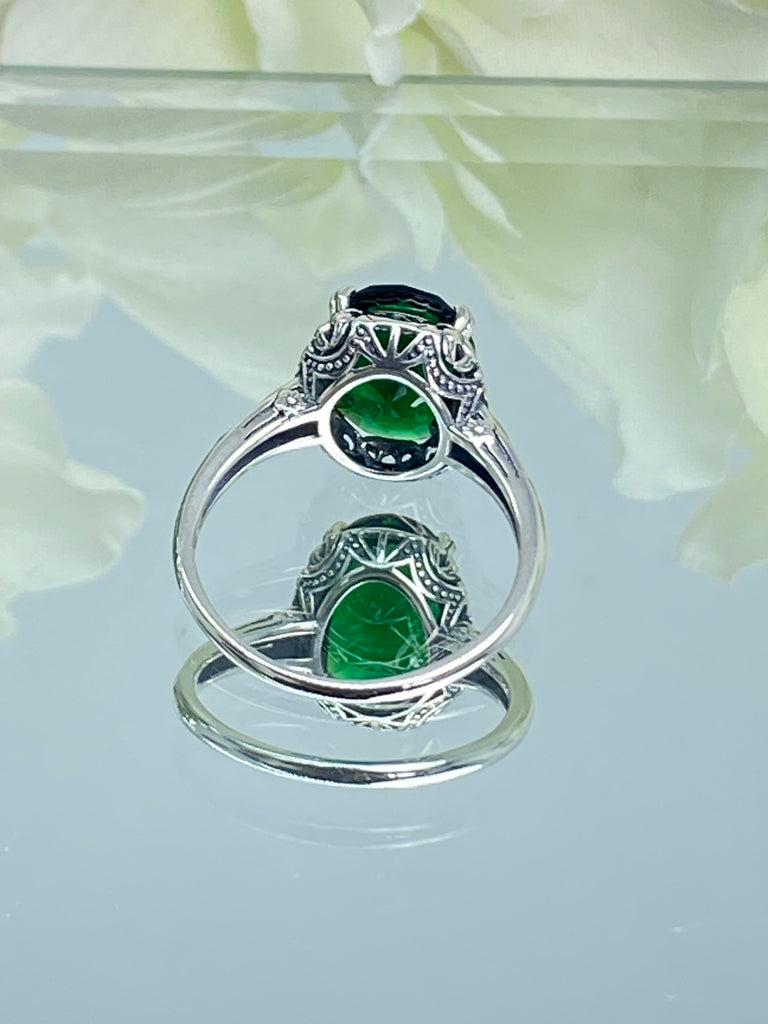 Emerald green Ring, Oval emerald green gemstone, sterling silver floral filigree, Edward Design #D70,  on a mirror