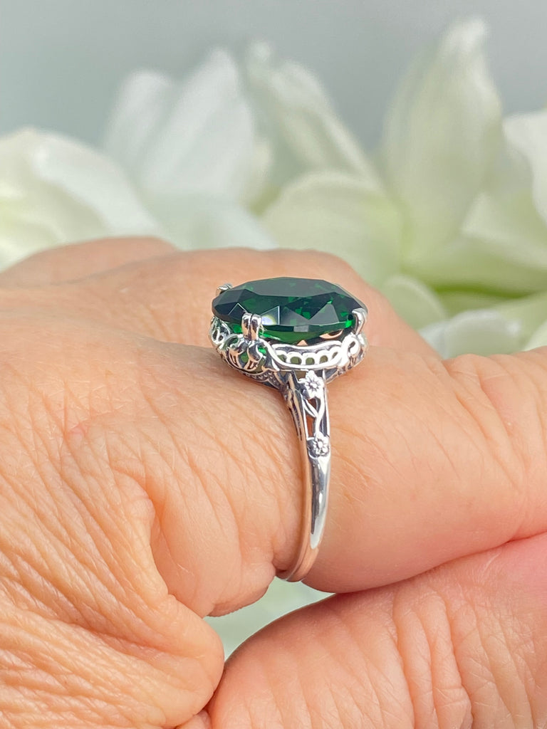 Emerald green Ring, Oval emerald green gemstone, sterling silver floral filigree, Edward Design #D70, on a finger