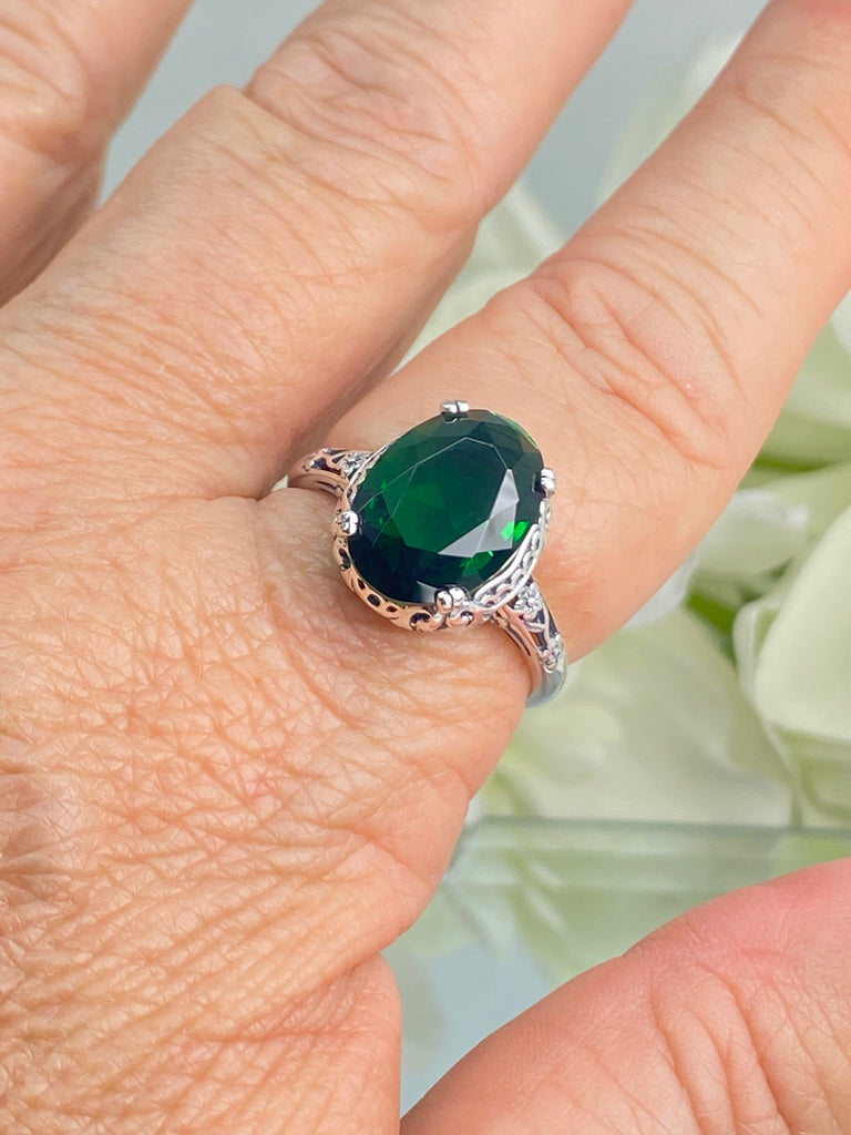 Emerald green Ring, Oval emerald green gemstone, sterling silver floral filigree, Edward Design #D70,  on a finger