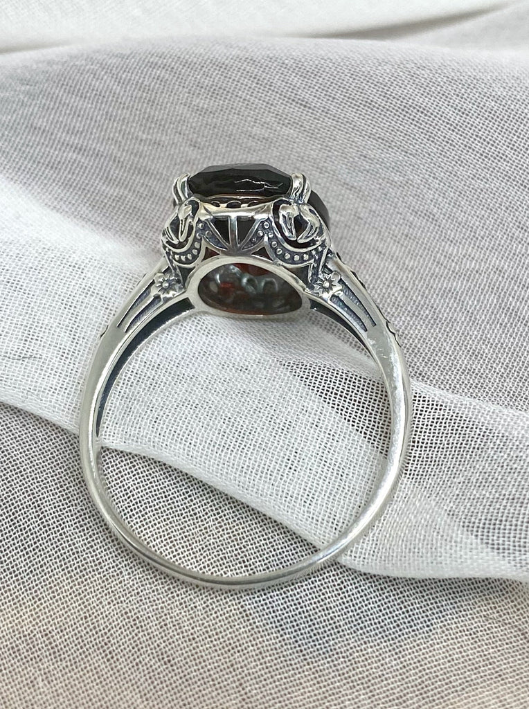 Simulated Red Garnet Ring, Sterling Silver floral filigree, Edward Design #D70,  back and top view on a soft cloth surface