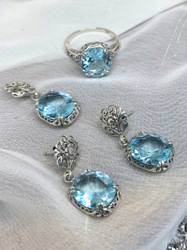 aquamarine jewelry set with sky blue oval stones and antique floral filigree, includes earrings, pendant  and floral bail and antique reproduction ring, Edward Design#70z