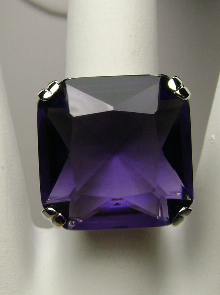 top view of large square purple amethyst gem in crisscross basket-weave filigree art deco styled ring