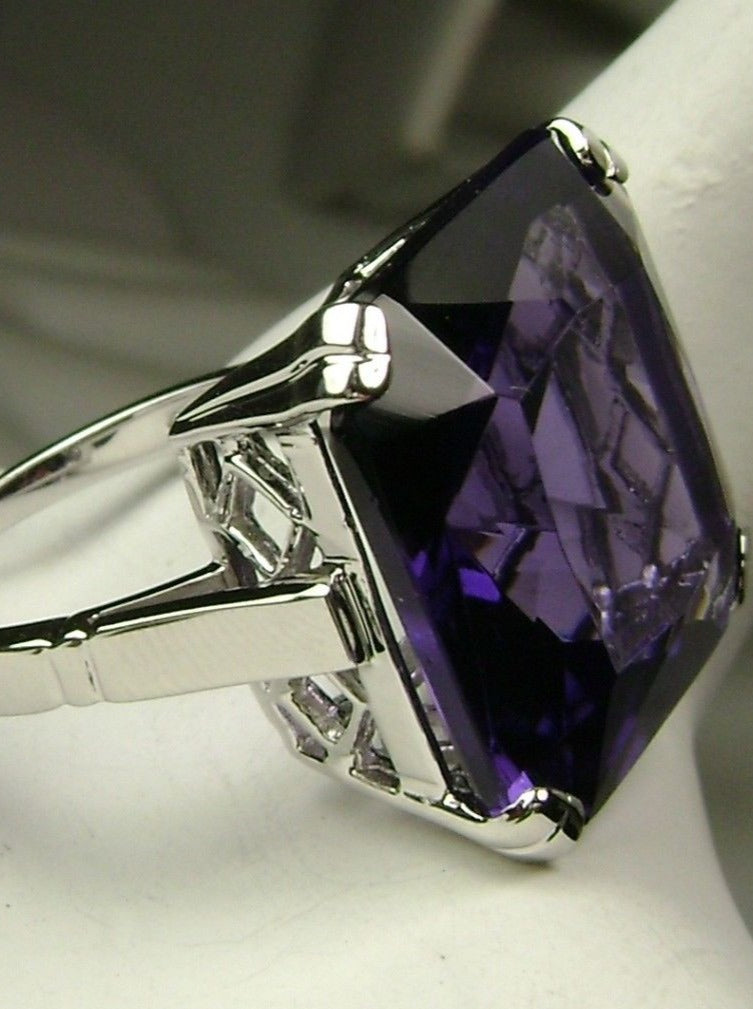 side view of large square purple amethyst gem in crisscross basket-weave filigree art deco styled ring