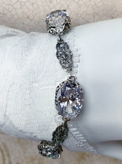White CZ Bracelet, brilliant oval gems, fine sterling silver filigree, lobster claw clasp, Edwardian Jewelry