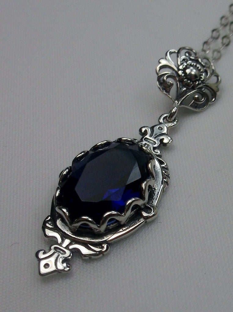 Blue Sapphire Pendant, Fleur de Lis filigree detail, oval gemstone, sterling silver vintage jewelry, Silver Embrace Jewelry, Pin Design#P18