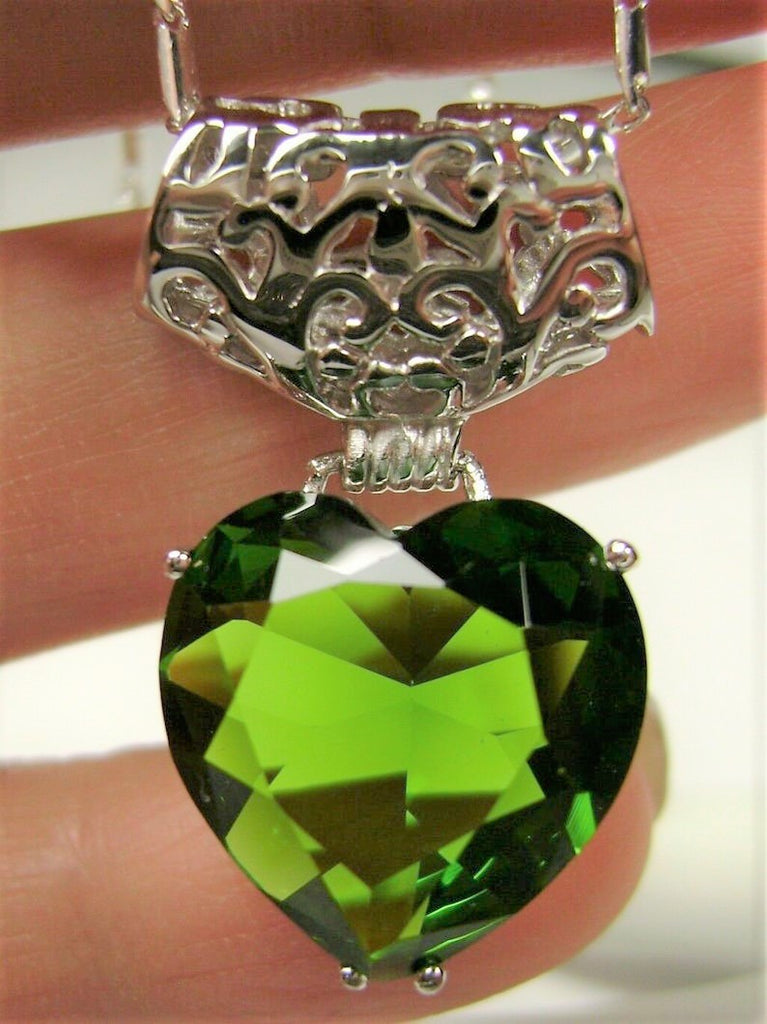 Heart shaped chartreuse light green peridot pendant with sterling silver filigree detail, Silver Embrace Jewelry, P38