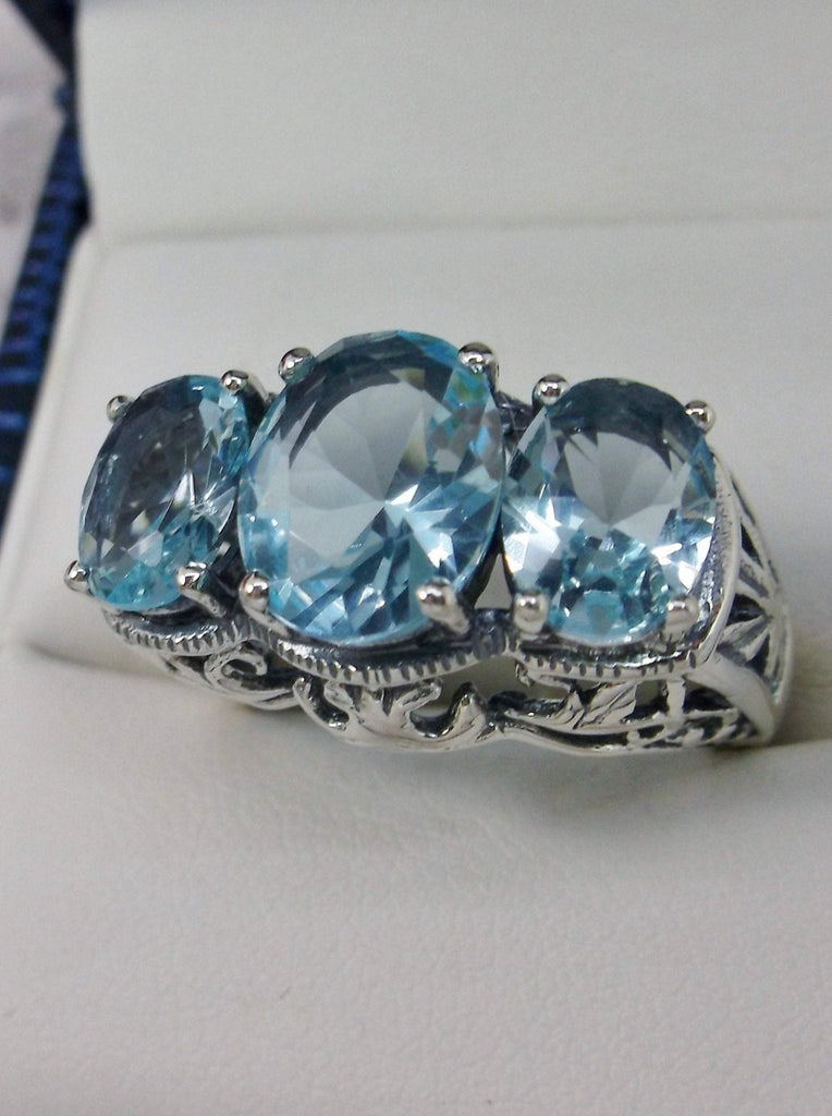 blue aquamarine three stone art deco style ring with silver antique filigree