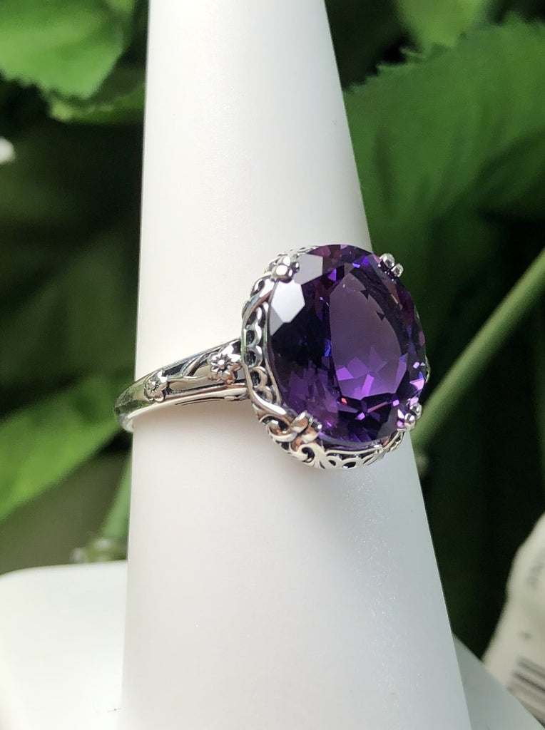 Natural Amethyst Ring, 3.3ct Natural oval Amethyst, Sterling Silver floral Filigree, Edward design #D70z, offset front view on hand form
