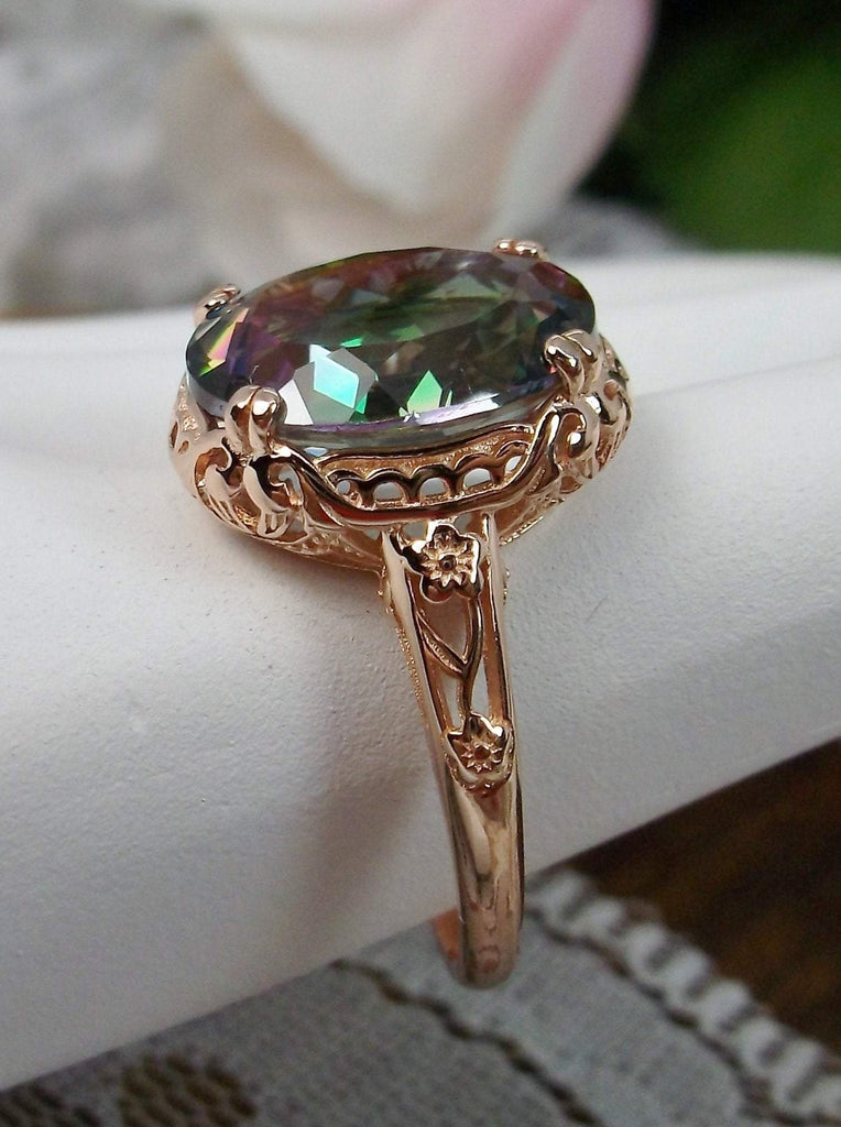 Natural Mystic Topaz Ring,  Oval Faceted natural gemstone, Rose Gold over Sterling Silver floral filigree, Edward design #D70z,  side view on hand form