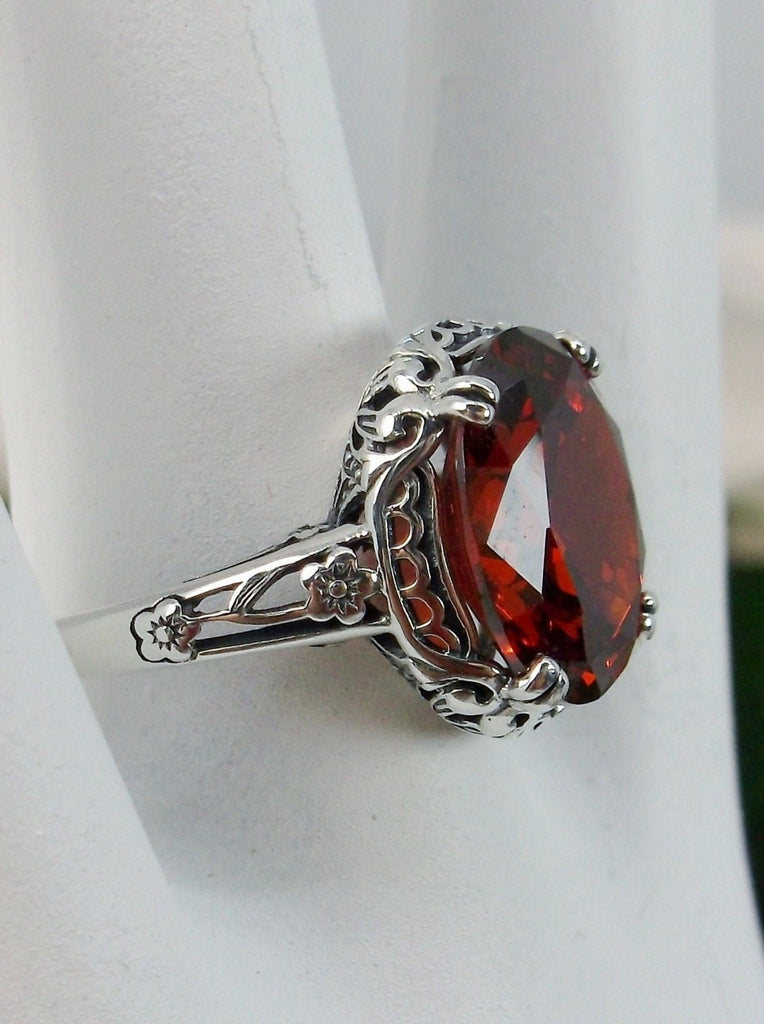 Red Garnet CZ Ring, Sterling Silver floral filigree, Edward Design #D70z, side view on ring holder