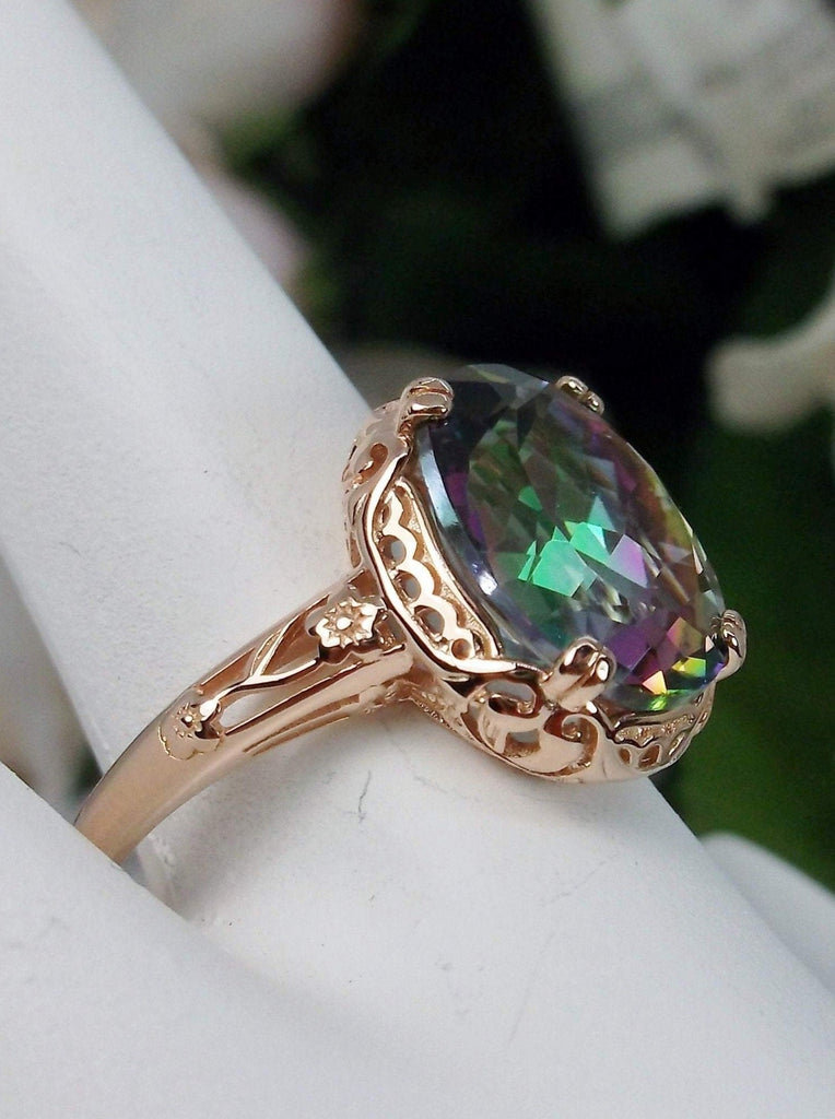 Natural Mystic Topaz Ring,  Oval Faceted natural gemstone, Rose Gold over Sterling Silver floral filigree, Edward design #D70z, side view on hand form