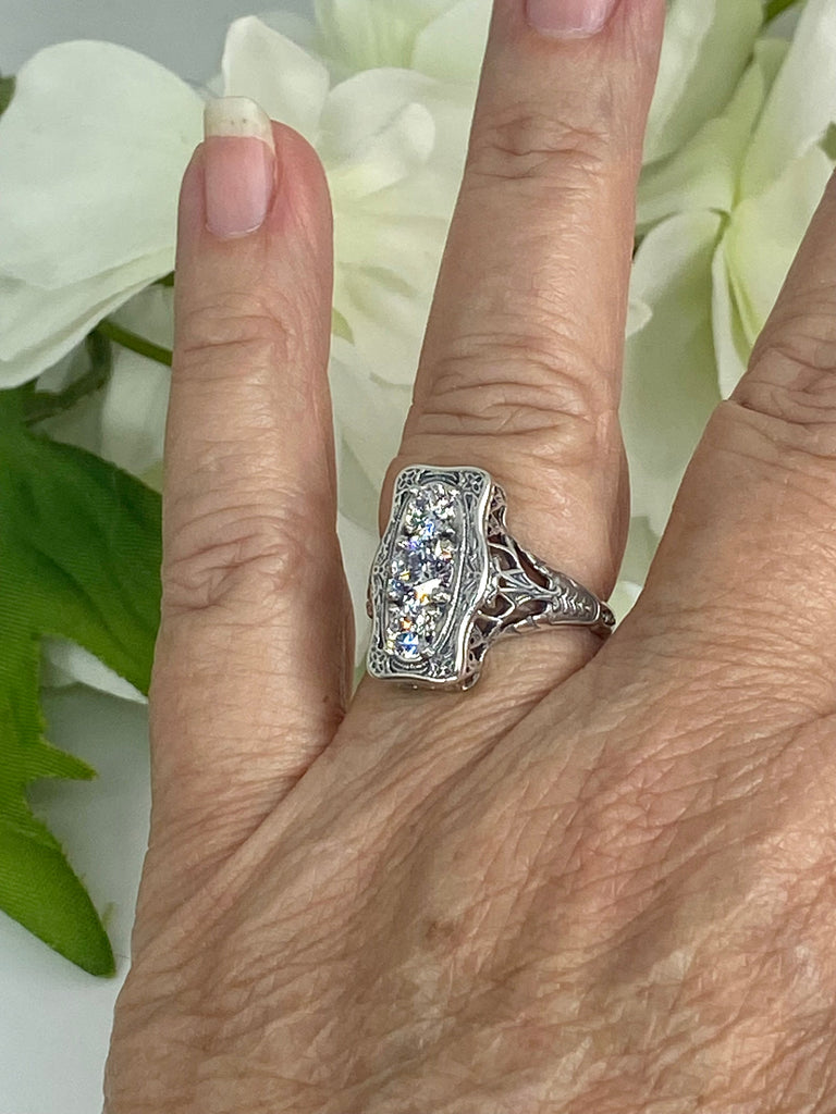 a close up of a person's hand with a ring on it, White CZ Ring, 3 round gems set in a rectangle design, Vintage style sterling silver filigree, D60 Three stone rectangle, Trinity ring