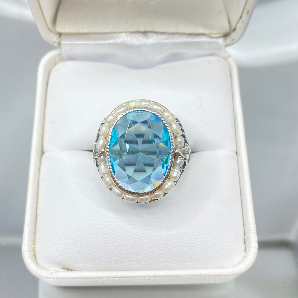 Blue Aquamarine Ring, Sterling Silver Leaf Filigree, Pearl Frame, Vintage Jewelry, Silver Embrace Jewelry, D8 Leaf Pearl Design, Ring with blue gemstone and pearl accents in a white jewelry box