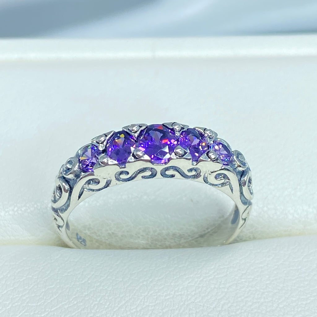 Silver ring with purple gemstones on a white surface, Amethyst Ring, CZ gemstones, Sterling silver filigree, silver Embrace Jewelry, Georgian design, D19
