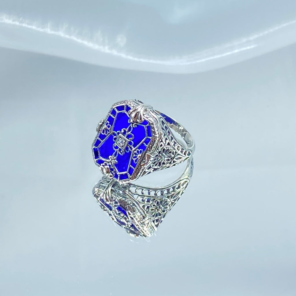 Sapphire Blue Glass Ring with Sterling Silver Art Deco Filigree and a single white CZ in the center of the pane sections