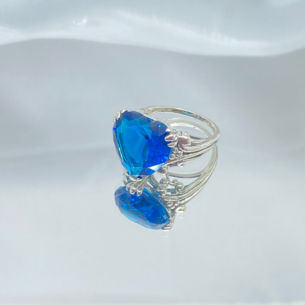 London Blue Topaz ring with a heart shaped gem and gothic style sterling silver filigree