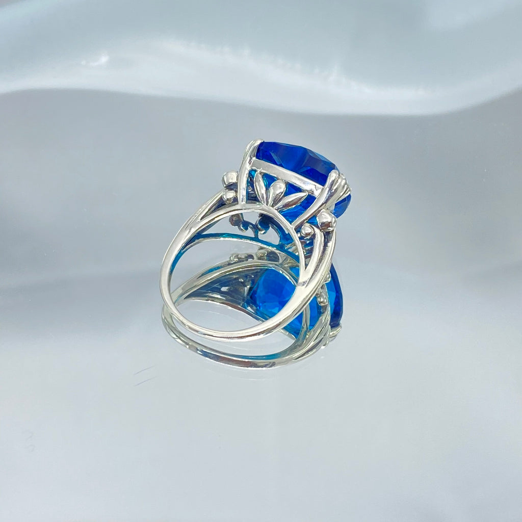 London Blue Topaz ring with a heart shaped gem and gothic style sterling silver filigree