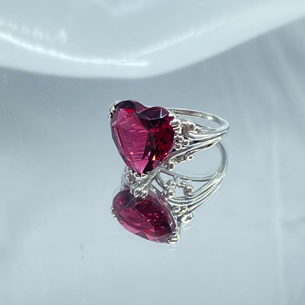 Silver ring with heart-shaped purple gemstones on a mirror, Ruby Ring, Heart Ring, Sterling Silver Filigree, silver Embrace Jewelry, D213