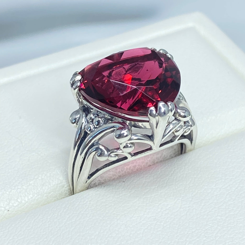 Silver ring with a large red gemstone on a white background, Ruby Ring, Heart Ring, Sterling Silver Filigree, silver Embrace Jewelry, D213