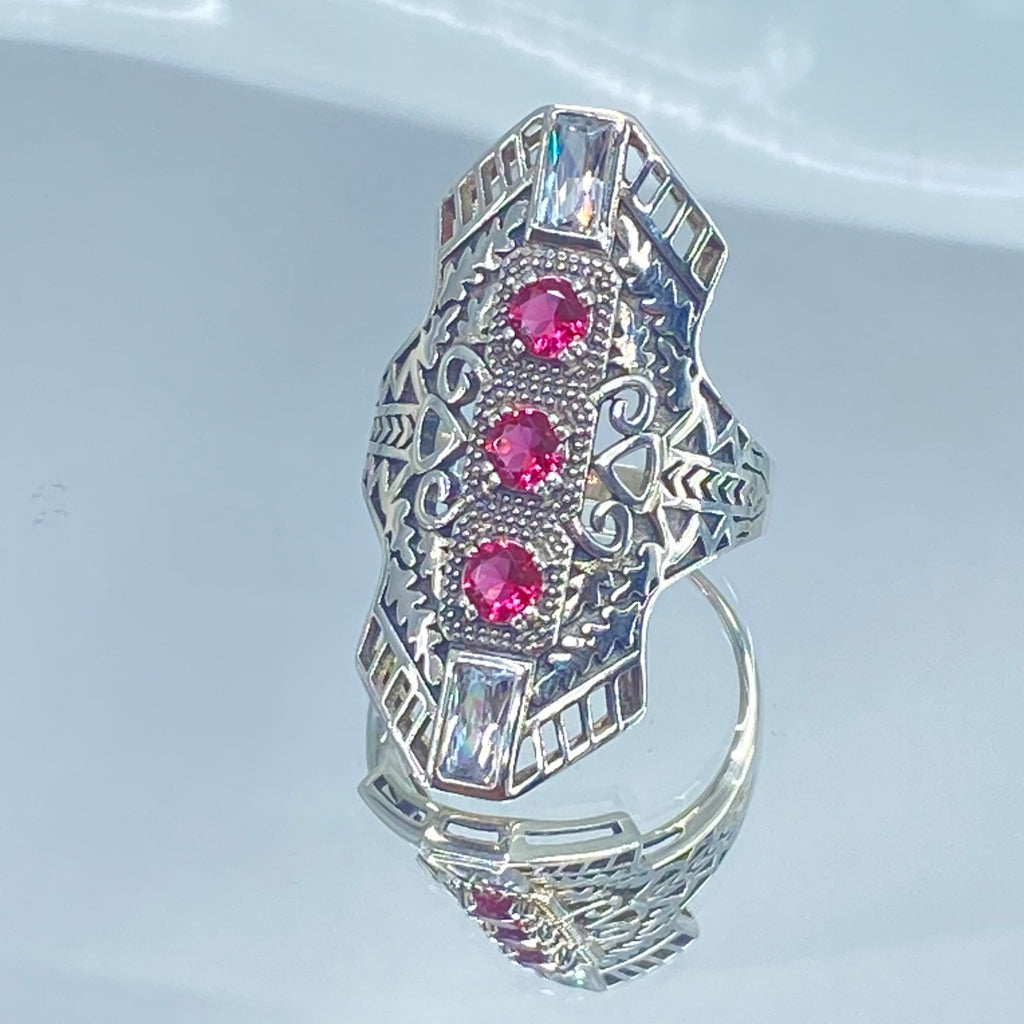 Ruby Red Art Deco Ring, with three round stones and two baguette stones, intricate 1930s sterling silver filigree adorns the ring and the band, Long Deco D214, Silver Embrace Jewelry