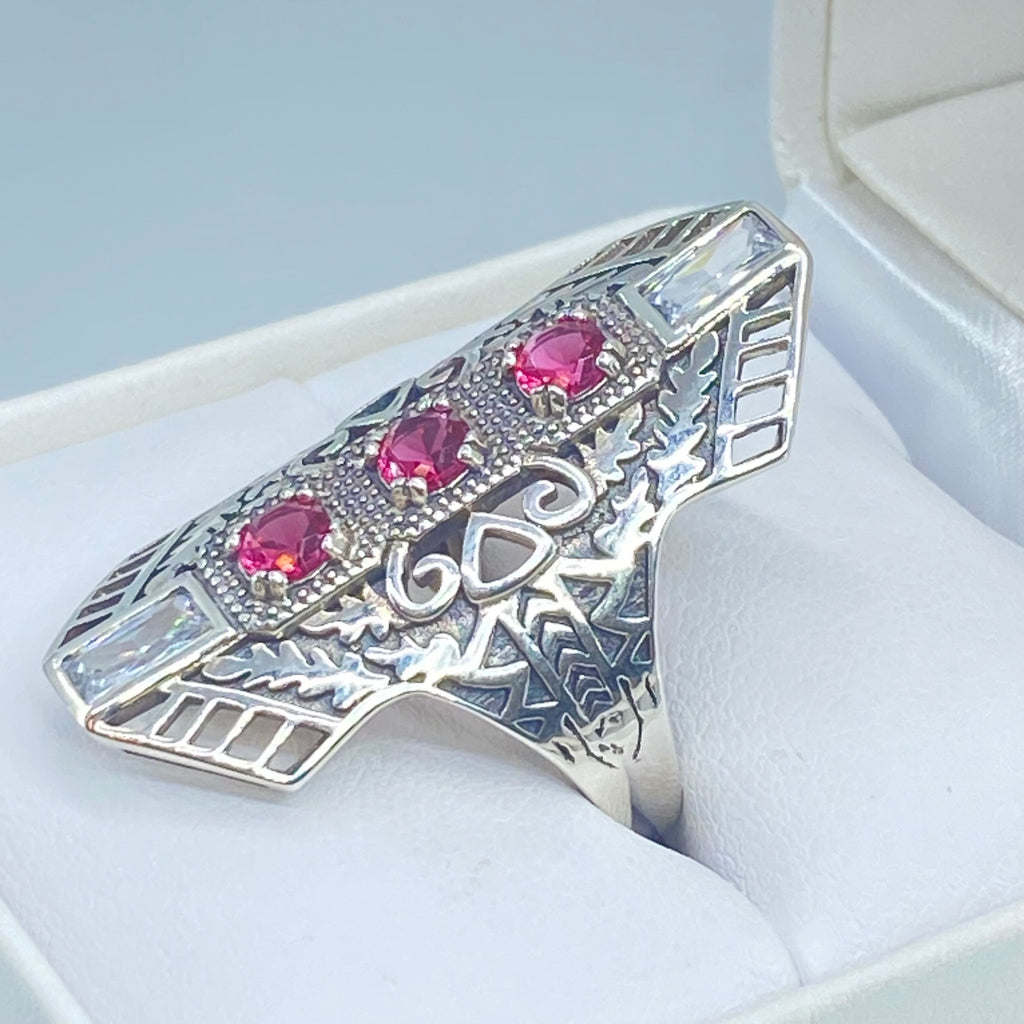 Ruby Red Art Deco Ring, with three round stones and two baguette stones, intricate 1930s sterling silver filigree adorns the ring and the band, Long Deco D214, Silver Embrace Jewelry