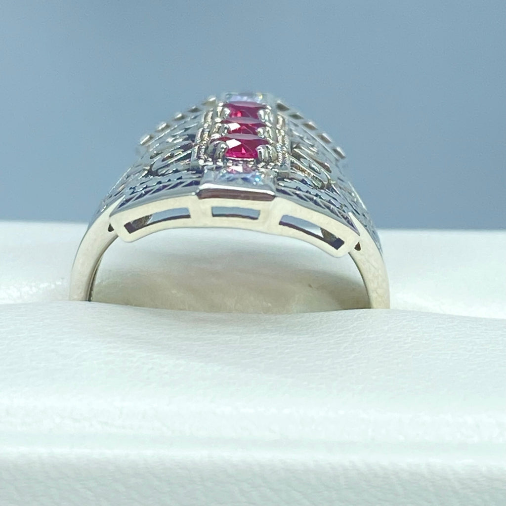 Ruby Red Art Deco Ring, with three round stones and two baguette stones, intricate 1930s sterling silver filigree adorns the ring and the band, Long Deco D214, Silver Embrace Jewelry