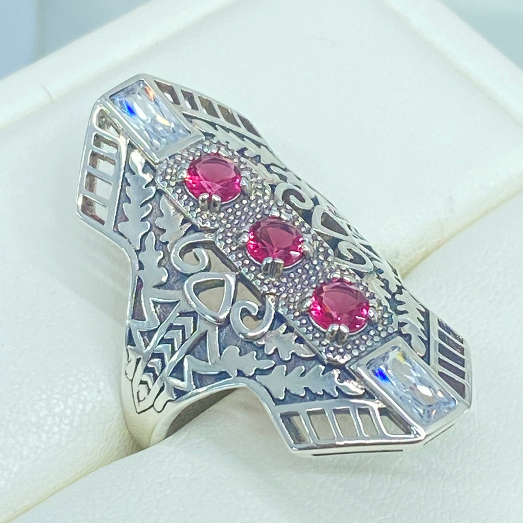 Ruby Red Art Deco Ring, with three round stones and two baguette stones, intricate 1930s sterling silver filigree adorns the ring and the band, Long Deco D214, Silver Embrace Jewelry