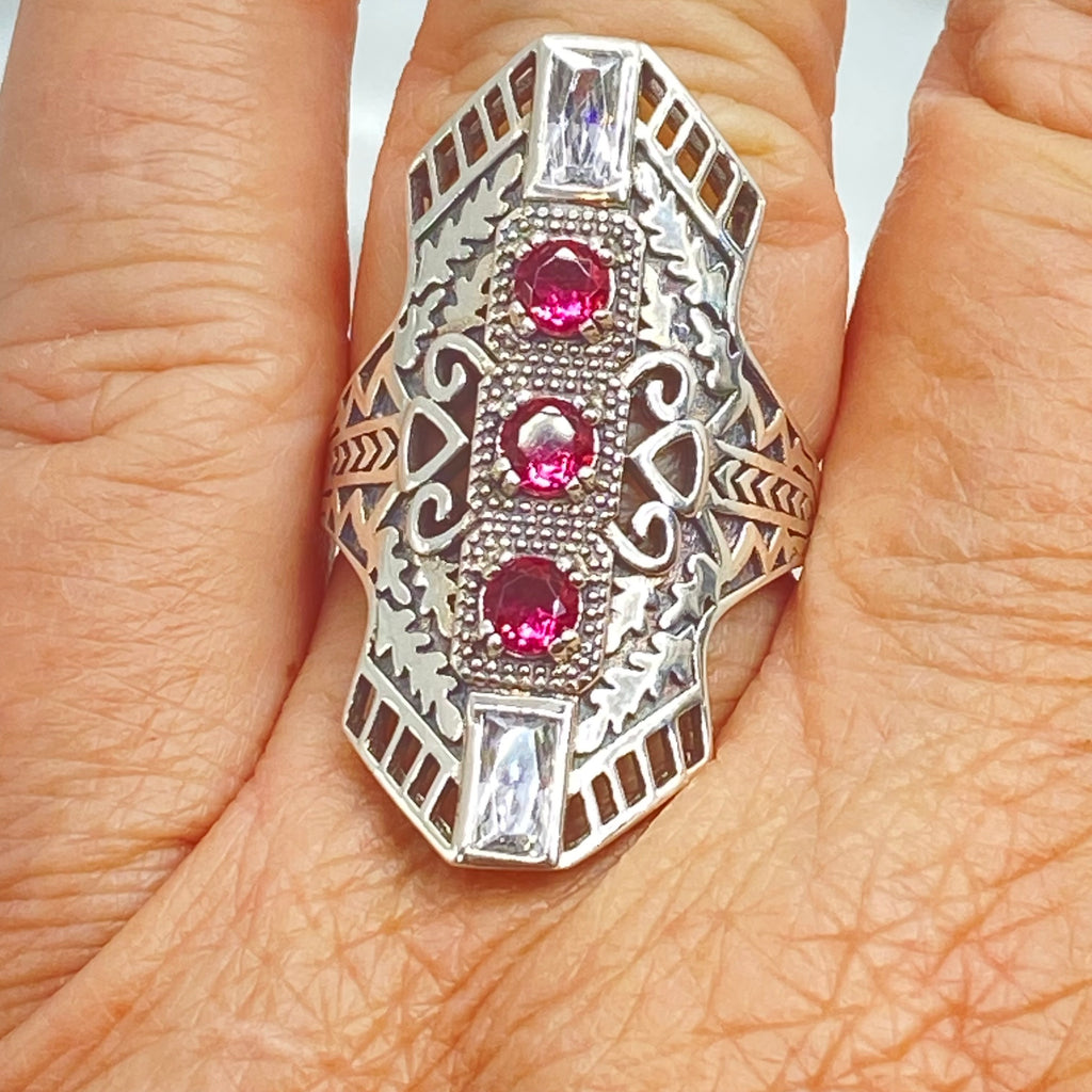 Ruby Red Art Deco Ring, with three round stones and two baguette stones, intricate 1930s sterling silver filigree adorns the ring and the band, Long Deco D214, Silver Embrace Jewelry