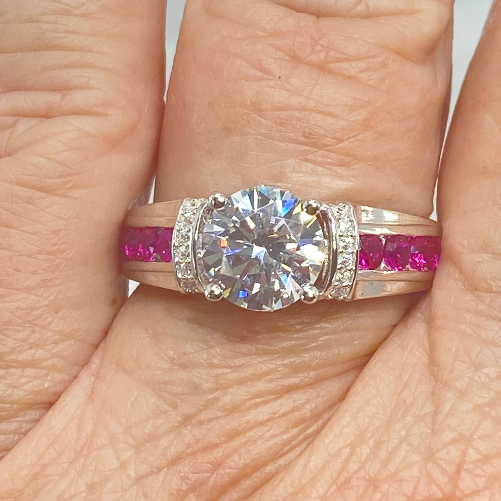 Ring with a large faux diamond and pink gemstones on a hand, White CZ & Ruby Ring, D220, Deco Inlay design, Sterling silver filigree, Silver Embrace Jewelry