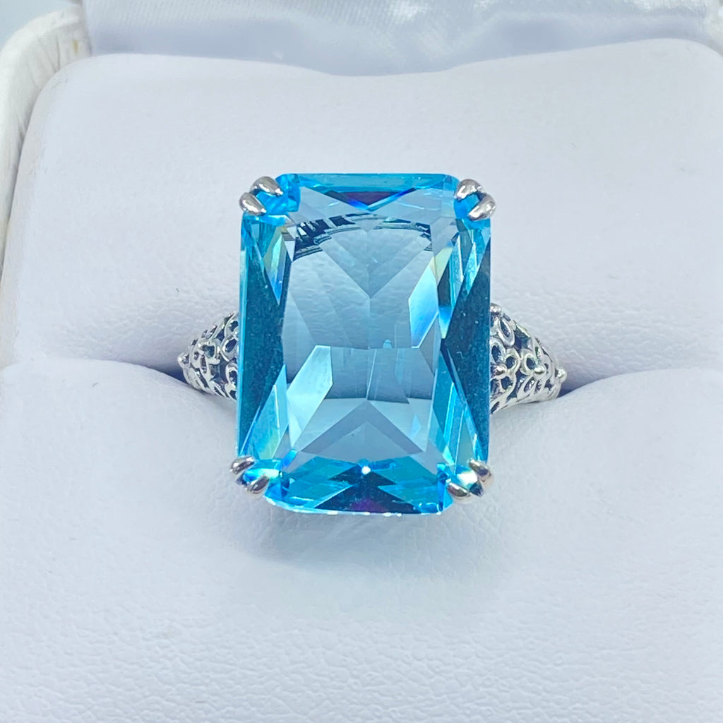 Ring with a large blue gemstone on a white cushion, Aquamarine ring, Sky Blue Gemstone, cushion Cut, rectangle gemstone, Floral Vintage Sterling silver Filigree, Silver Embrace Jewelry, D224