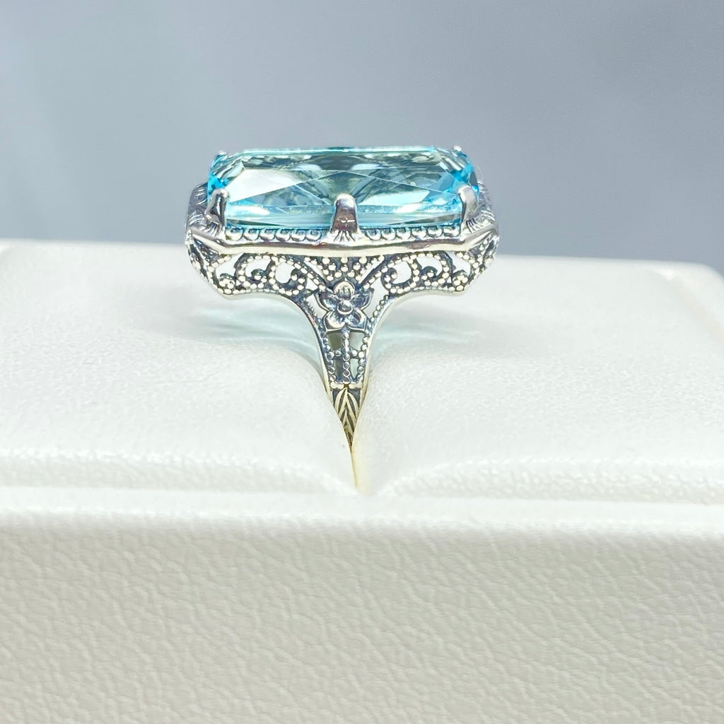 Simulated Aquamarine Ring, Edwardian Jewelry, Sterling silver filigree, Silver Embrace Jewelry D232, Aquamarine Ring with a large blue gemstone on a white cushion