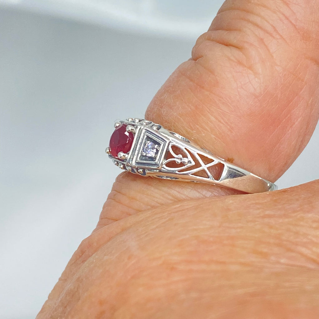 Art deco style ring with a natural ruby stone in the center, and two white CZ accents on either side set in sterling silver deco filigree, Silver Embrace Jewelry, DecoBand, D49 