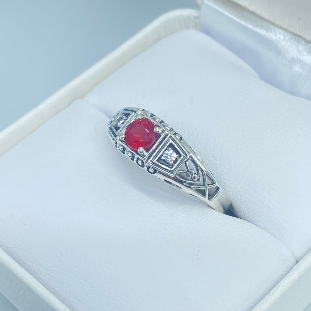 Art deco style ring with a natural ruby stone in the center, and two white CZ accents on either side set in sterling silver deco filigree, Silver Embrace Jewelry, DecoBand, D49 