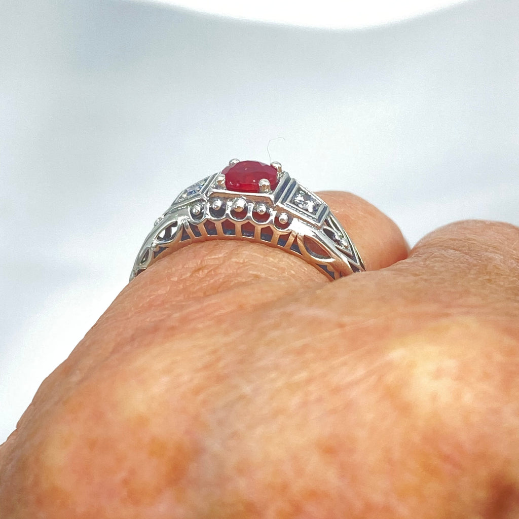 Art deco style ring with a natural ruby stone in the center, and two white CZ accents on either side set in sterling silver deco filigree, Silver Embrace Jewelry, DecoBand, D49 