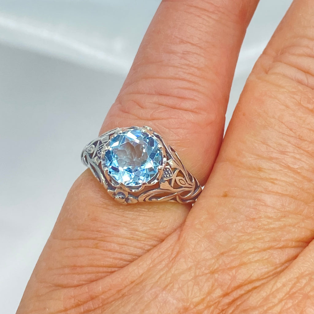 Natural blue topaz ring, sterling silver filigree, daisy design #D66; Silver Embrace Jewelry, Daisy Ring