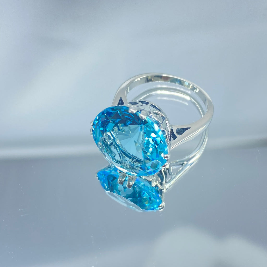 Aquamarine Ring, Fleur de Lis Ring - Vintage Jewelry D7 | Silver Embrace Jewelry, Stunning Art Nouveau/Victorian era-inspired ring from Silver Embrace features a 12ct man-made sky-blue aquamarine stone, hallmarked 925 sterling silver band and intricate filigree setting with fleur de lis designs