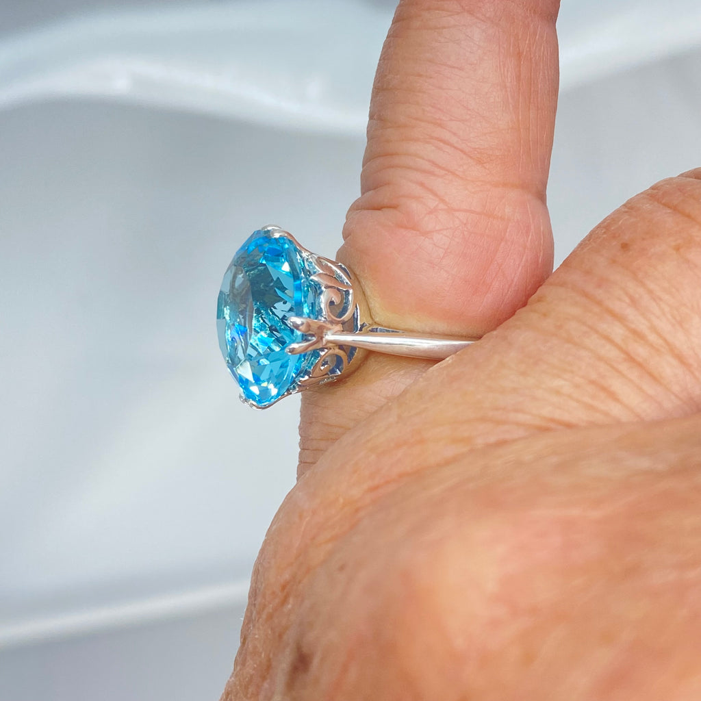 Aquamarine Ring, Fleur de Lis Ring - Vintage Jewelry D7 | Silver Embrace Jewelry, Stunning Art Nouveau/Victorian era-inspired ring from Silver Embrace features a 12ct man-made sky-blue aquamarine stone, hallmarked 925 sterling silver band and intricate filigree setting with fleur de lis designs