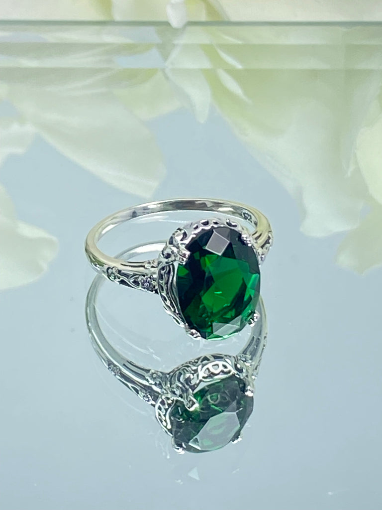 Emerald green Ring, Oval emerald green gemstone, sterling silver floral filigree, Edward Design #D70, on a mirror