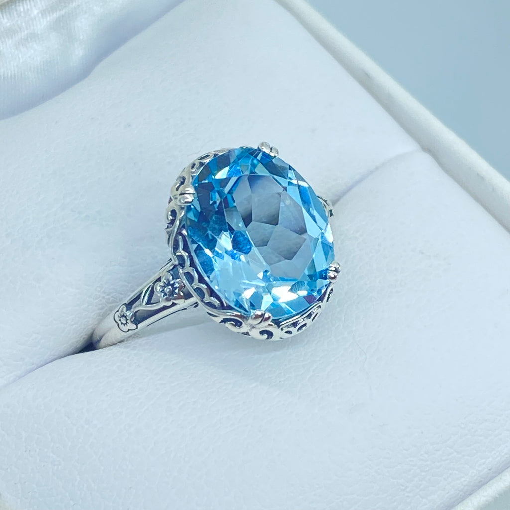 Natural Sky Blue Topaz Ring, 4.5 carat oval faceted stone, sterling Silver floral filigree, Edward design #D70z, top, offset and side views