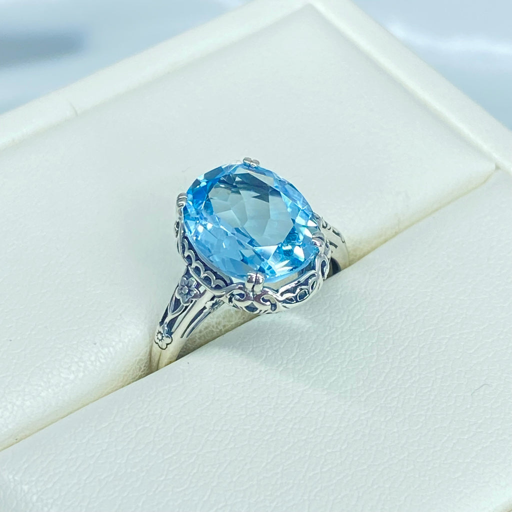 Natural Sky Blue Topaz Ring, 4.5 carat oval faceted stone, sterling Silver floral filigree, Edward design #D70z, top, offset and side views