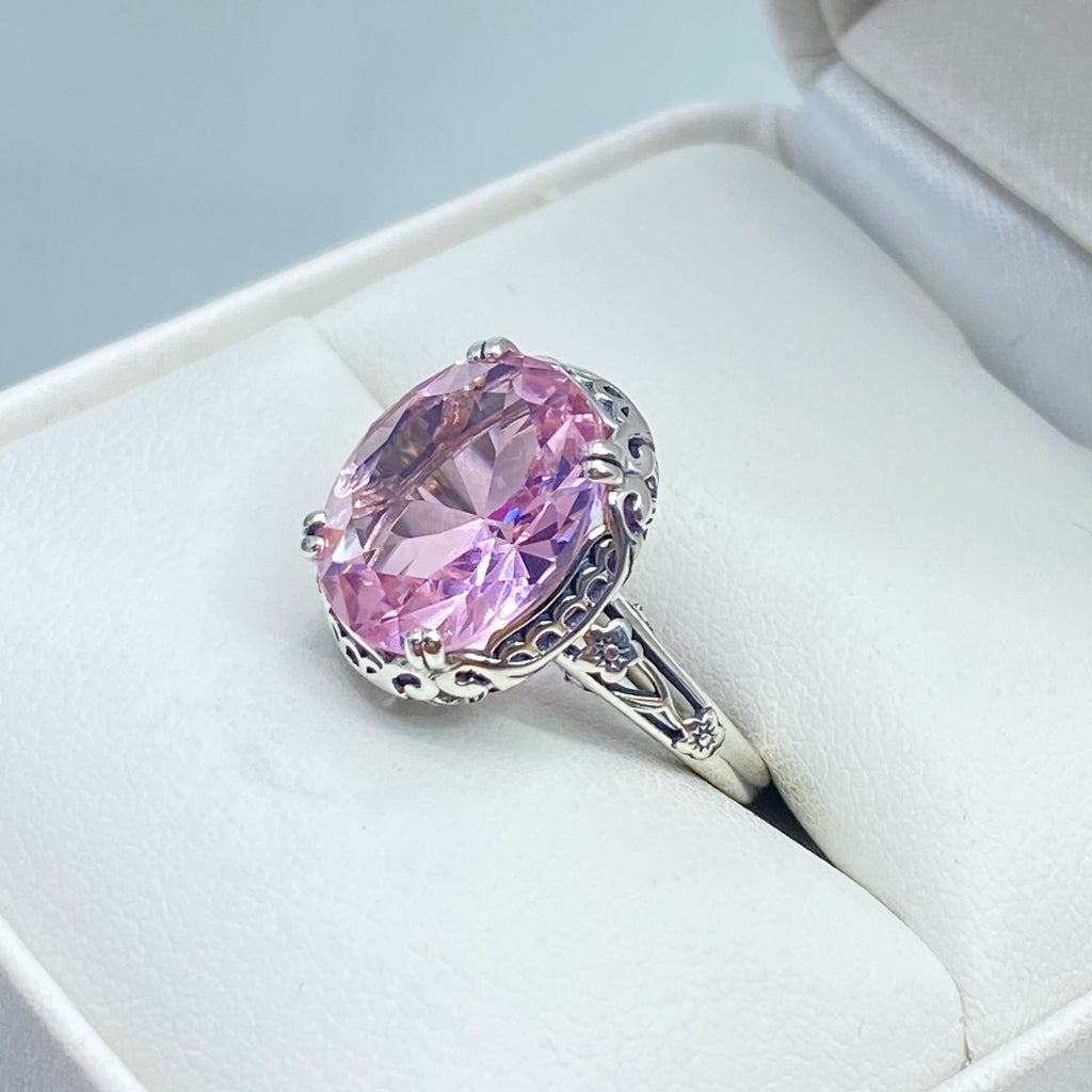 Ring with a large pink topaz gemstone in a white leather ring holder, Edward Design, sterling silver floral filigree, Silver Embrace Jewelry, D70z