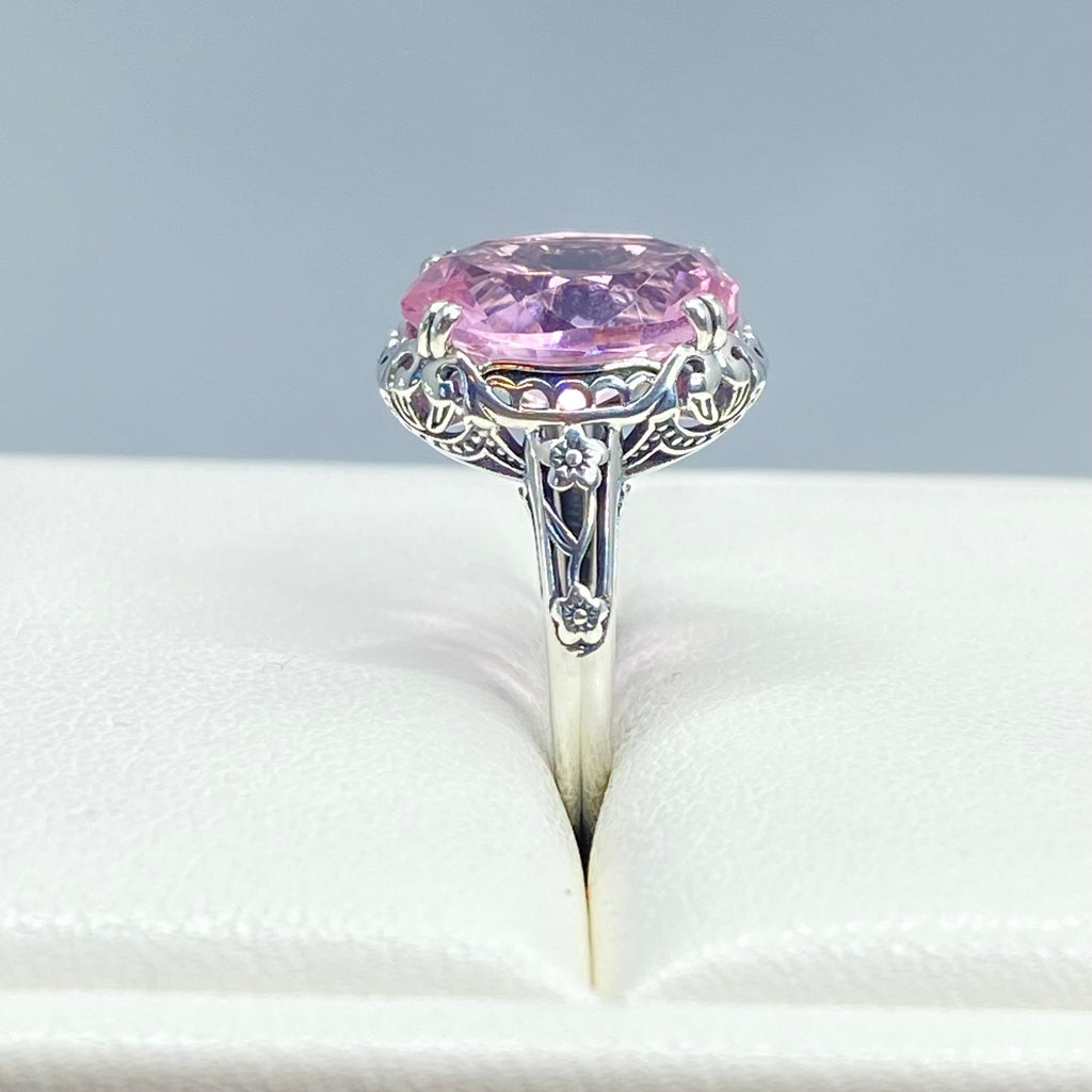 Ring with a large pink topaz gemstone in a white leather ring holder, Edward Design, sterling silver floral filigree, Silver Embrace Jewelry, D70z