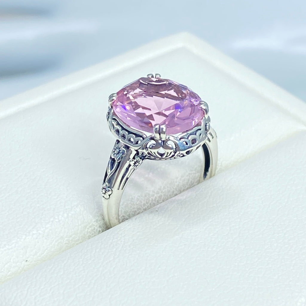 Ring with a large pink topaz gemstone in a white leather ring holder, Edward Design, sterling silver floral filigree, Silver Embrace Jewelry, D70z