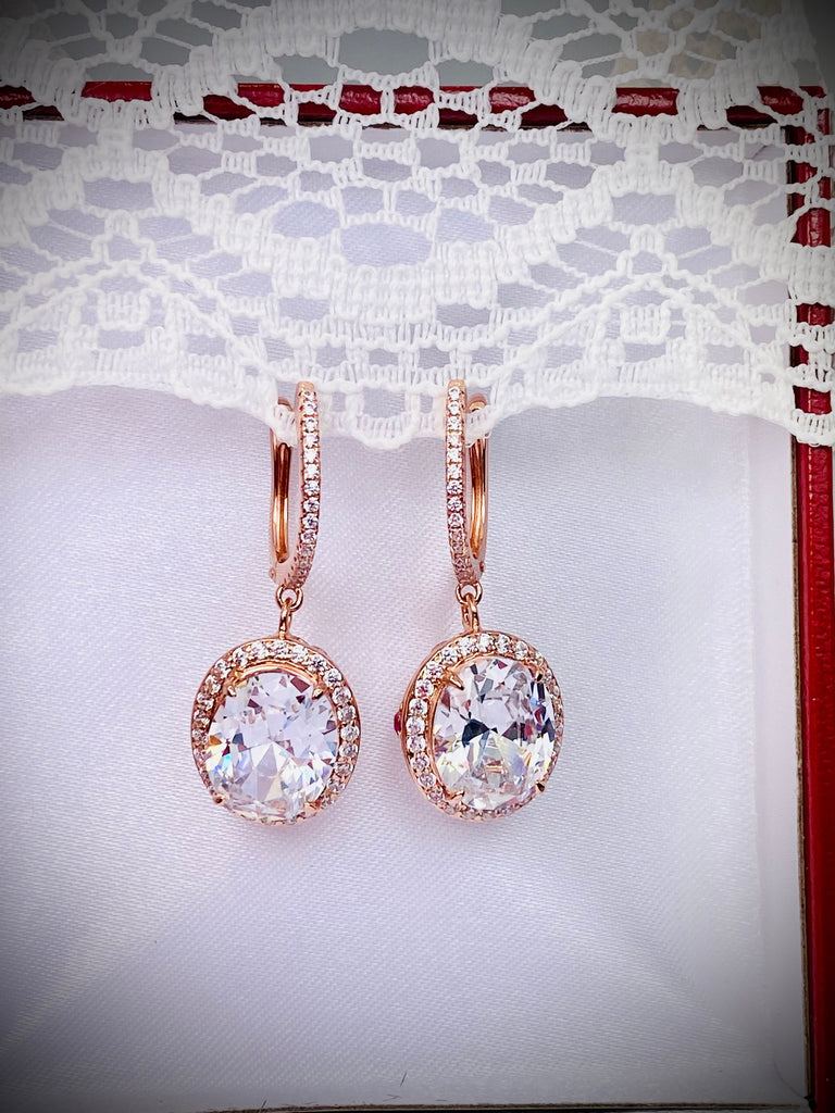 White CZ Earrings, with Rose Gold filigree, a bright sparkling CZ gemstone surrounded by more sparkling CZs with delicate rose gold filigree, latch back hooks with more CZs, Halo Earrings, E228, Silver Embrace Jewelry
