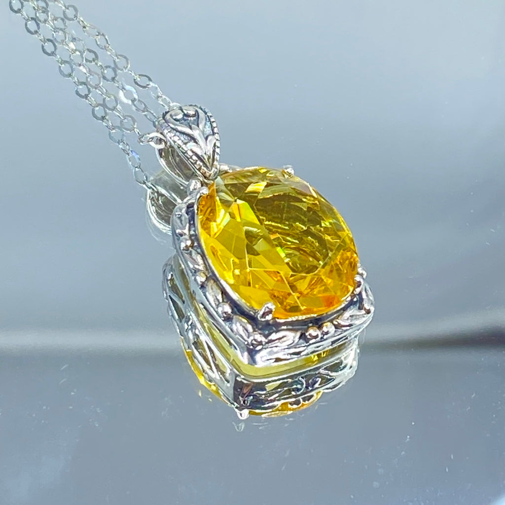 Yellow Citrine Pendant, oval citrine gemstone surrounded by sterling silver leaf accent detail, creating a charming Art Nouveau pendant, Silver Embrace Jewelry, P120