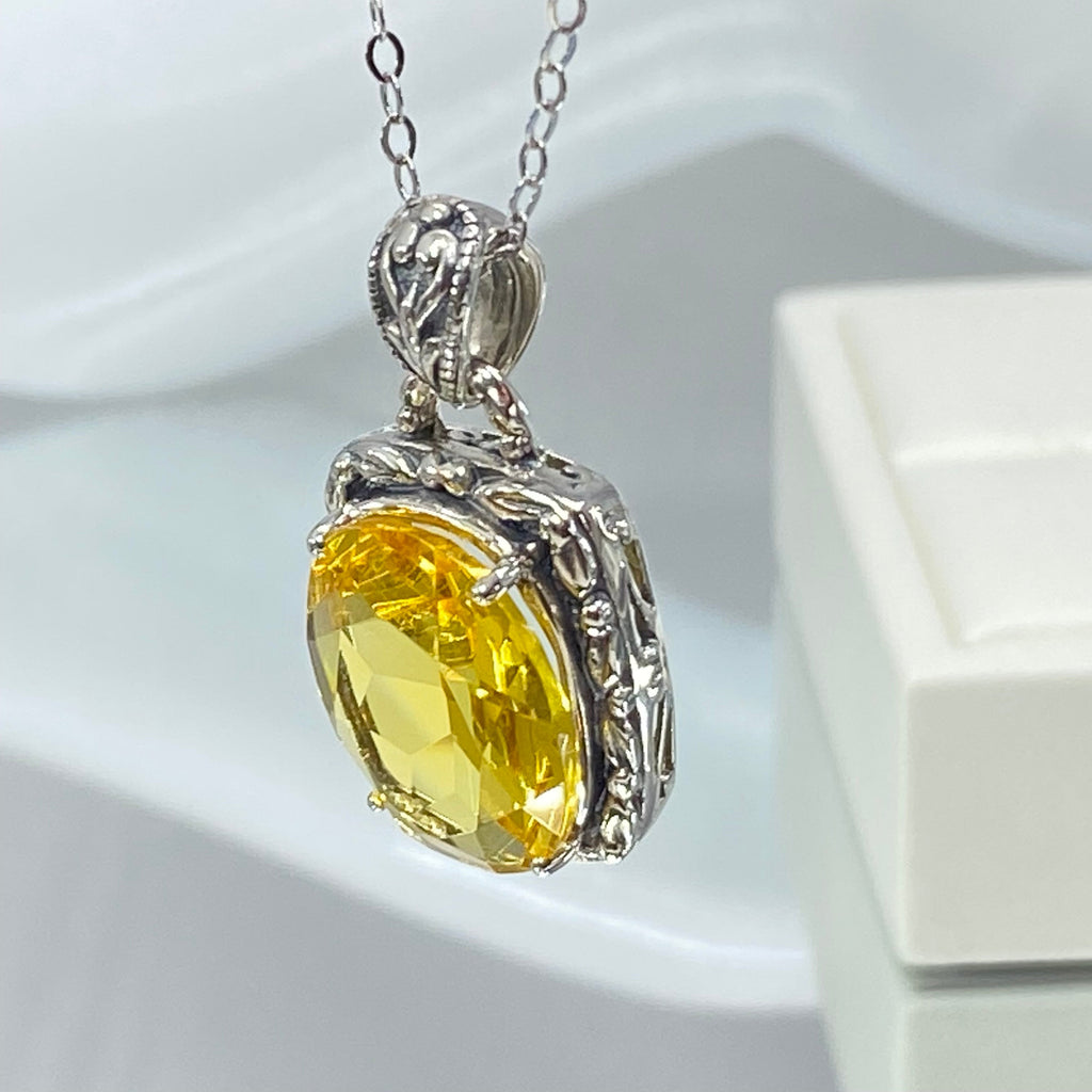 Yellow Citrine Pendant, oval citrine gemstone surrounded by sterling silver leaf accent detail, creating a charming Art Nouveau pendant, Silver Embrace Jewelry, P120