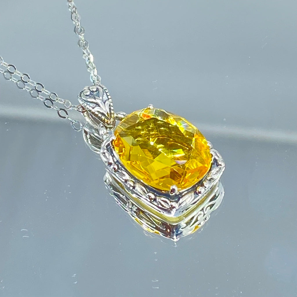 Yellow Citrine Pendant, oval citrine gemstone surrounded by sterling silver leaf accent detail, creating a charming Art Nouveau pendant, Silver Embrace Jewelry, P120