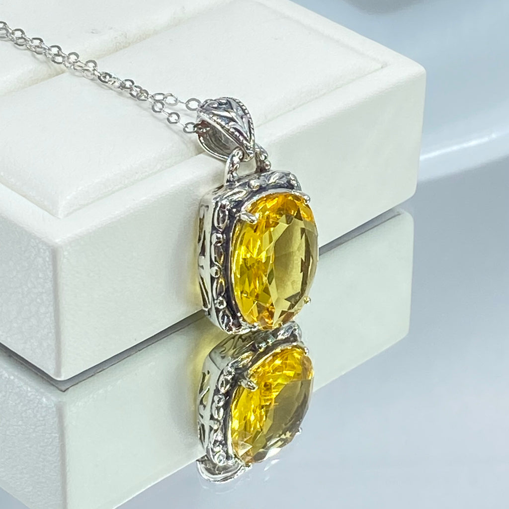 Yellow Citrine Pendant, oval citrine gemstone surrounded by sterling silver leaf accent detail, creating a charming Art Nouveau pendant, Silver Embrace Jewelry, P120